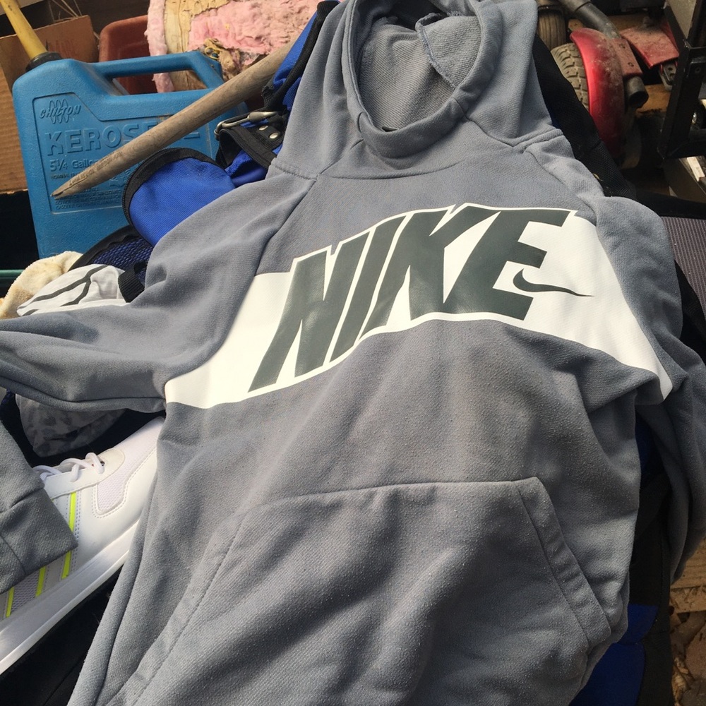 One gray/blue Nike sweat shirt